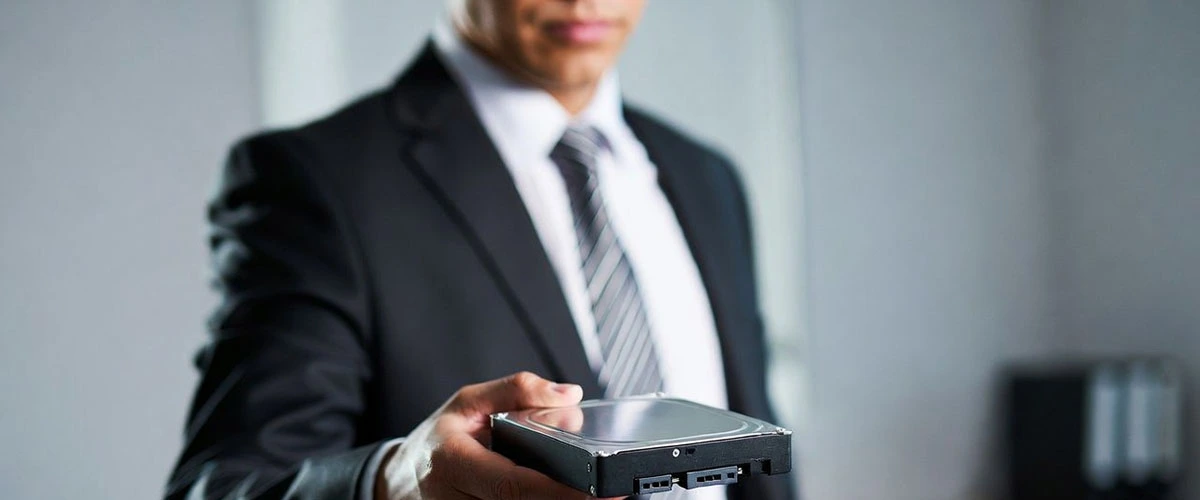 Digital forensic expert analyzing laptop data